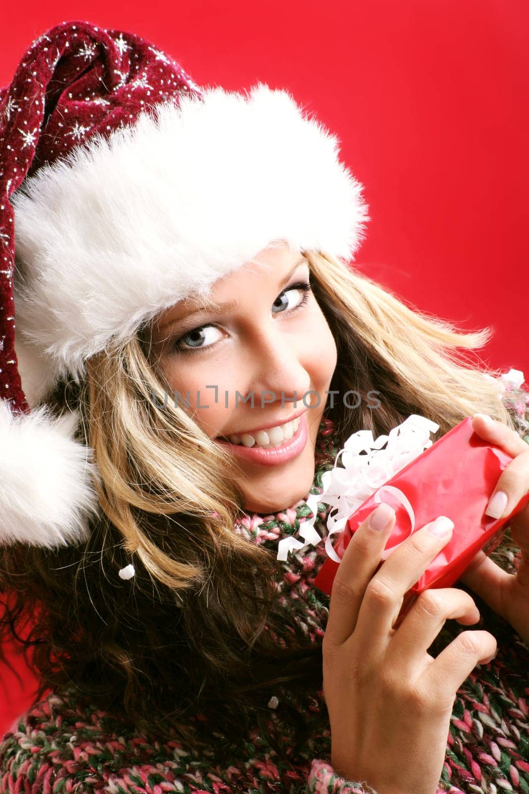 Woman at Christmas with gift