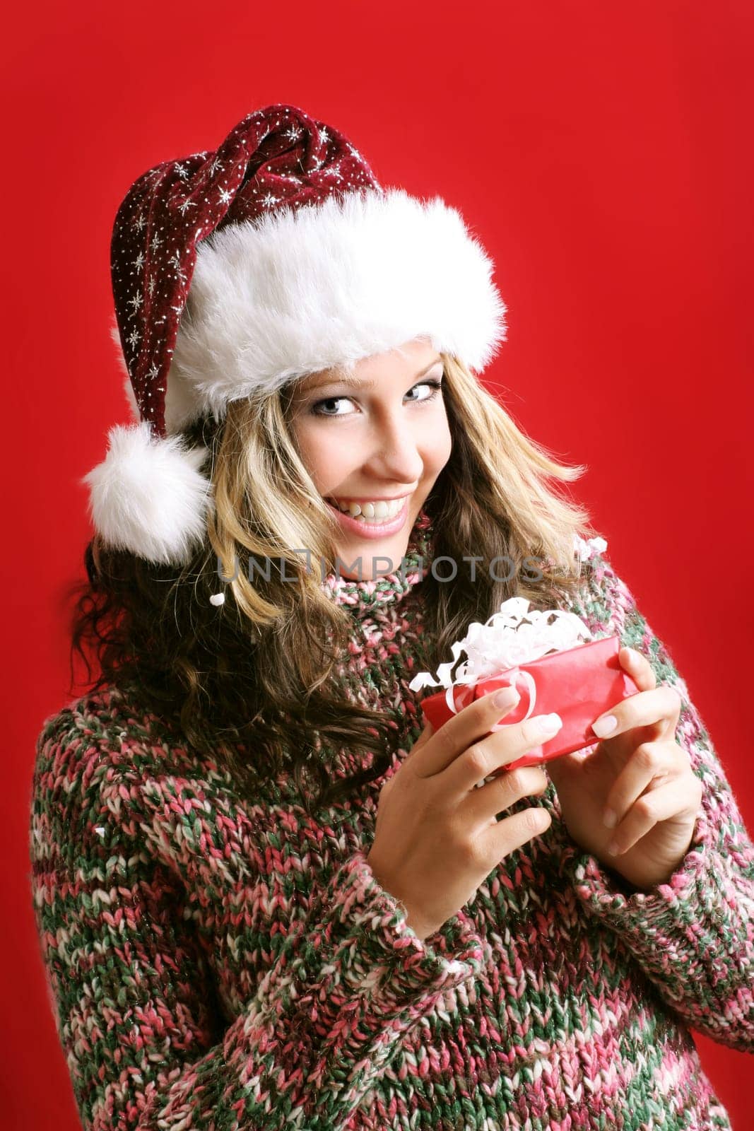 Woman at Christmas with gift