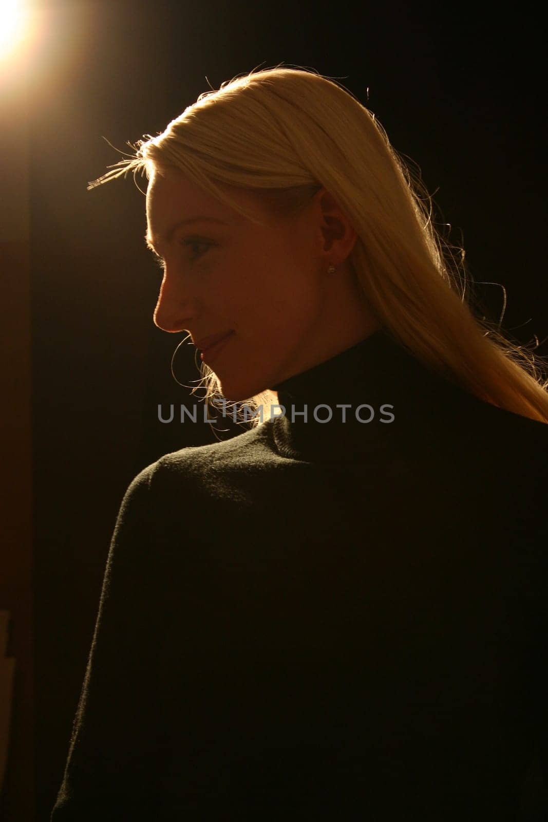 Blonde,young woman (portrait)