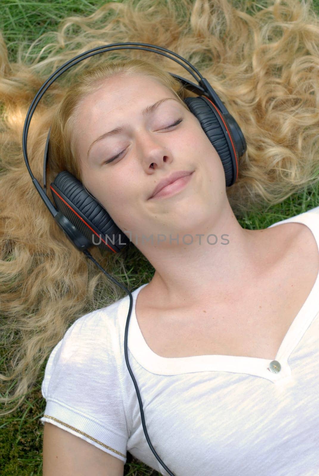 Young woman enjoying music