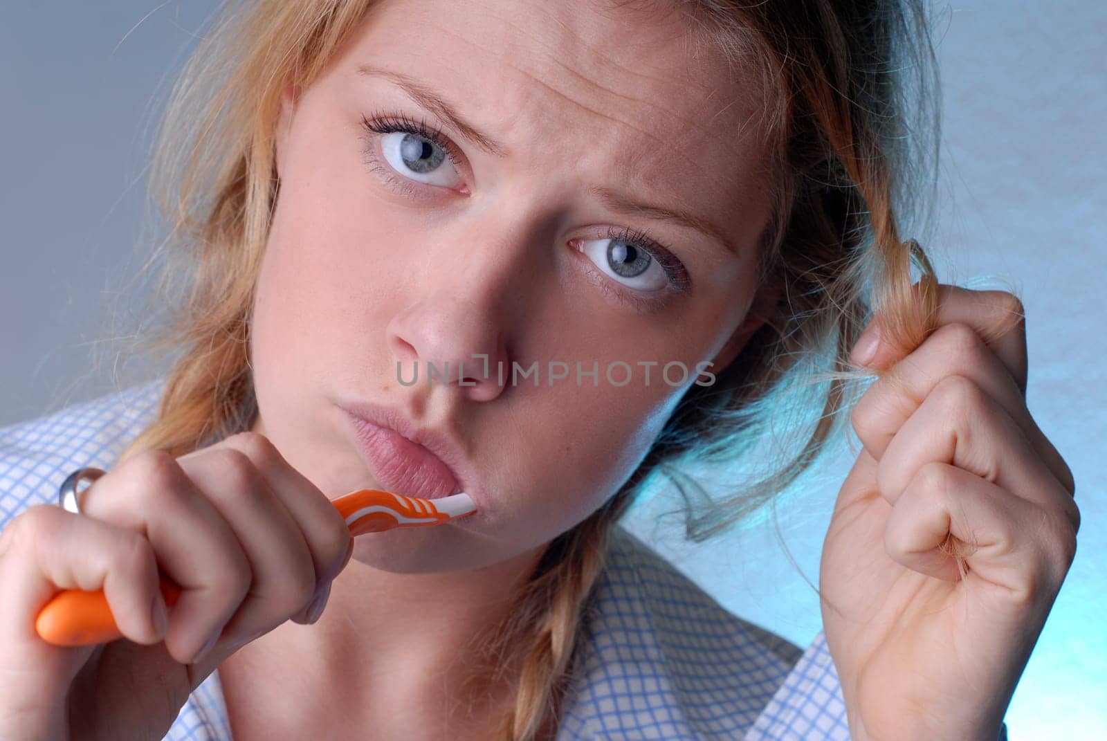 Woman brushing her teeth