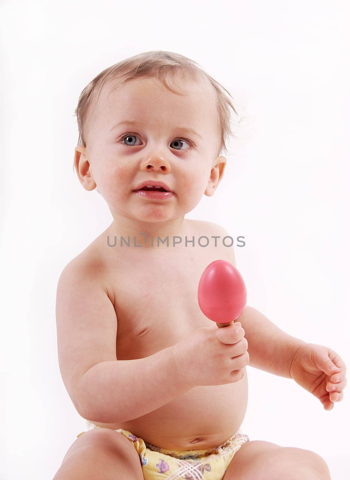 Child with rattle