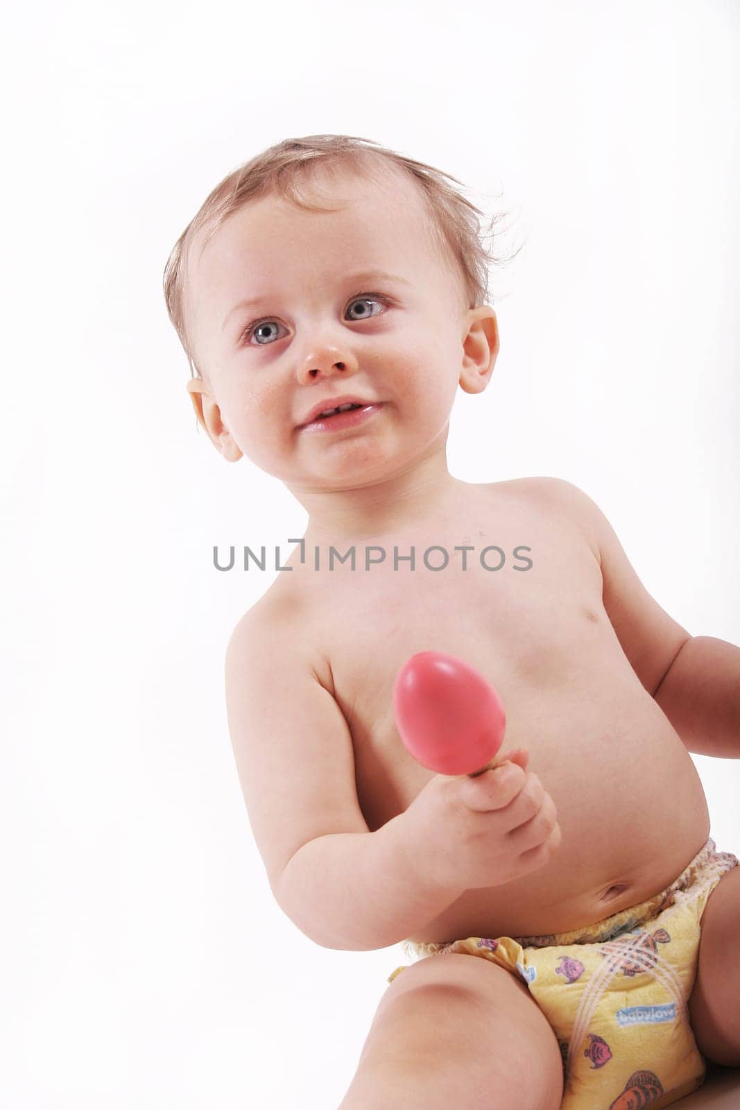 Child with rattle