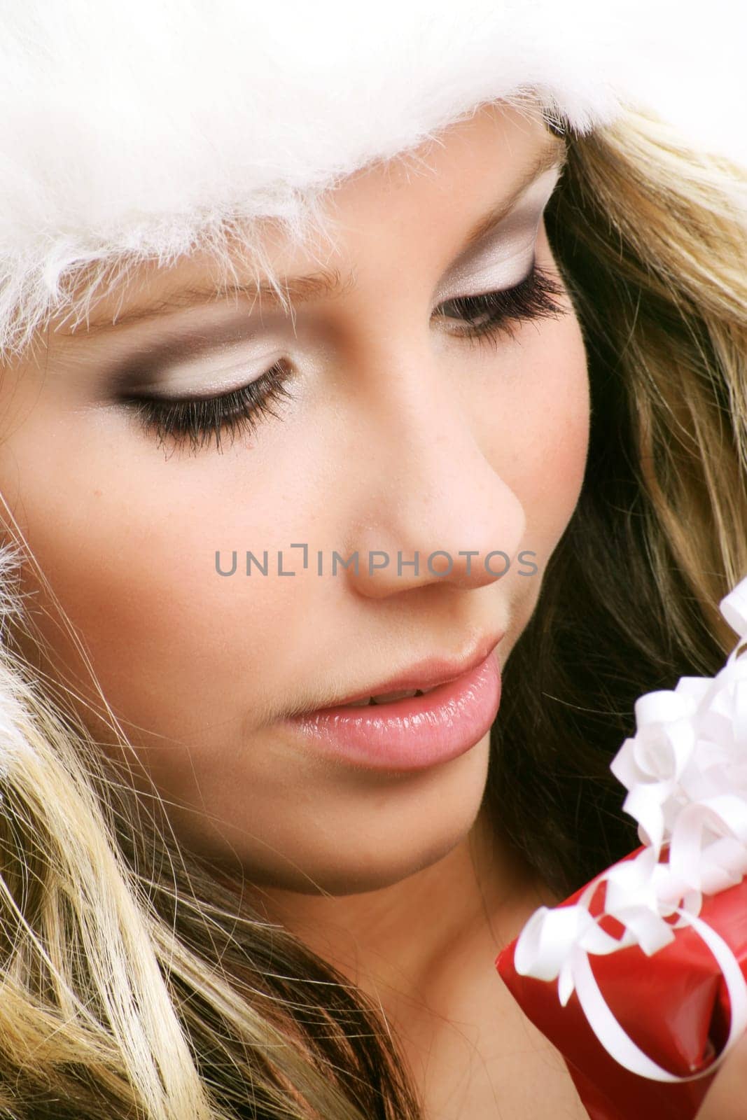 Woman at Christmas with gift