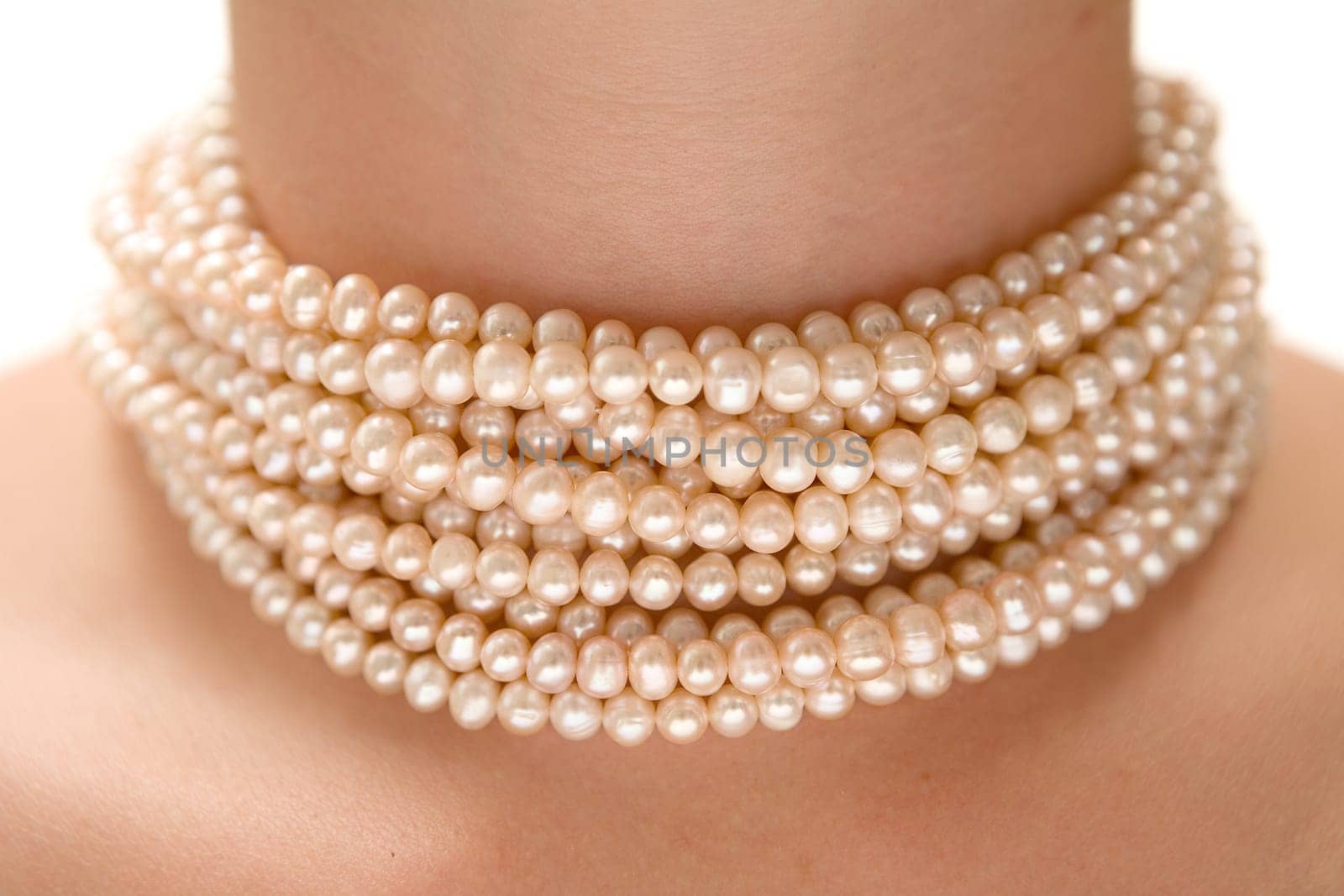 Wearing a pearl necklace