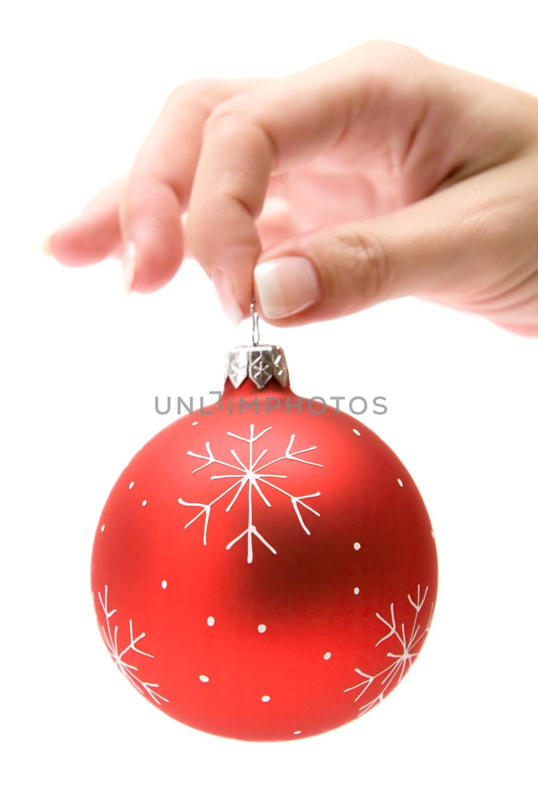 Hanging up the Christmas ornament
