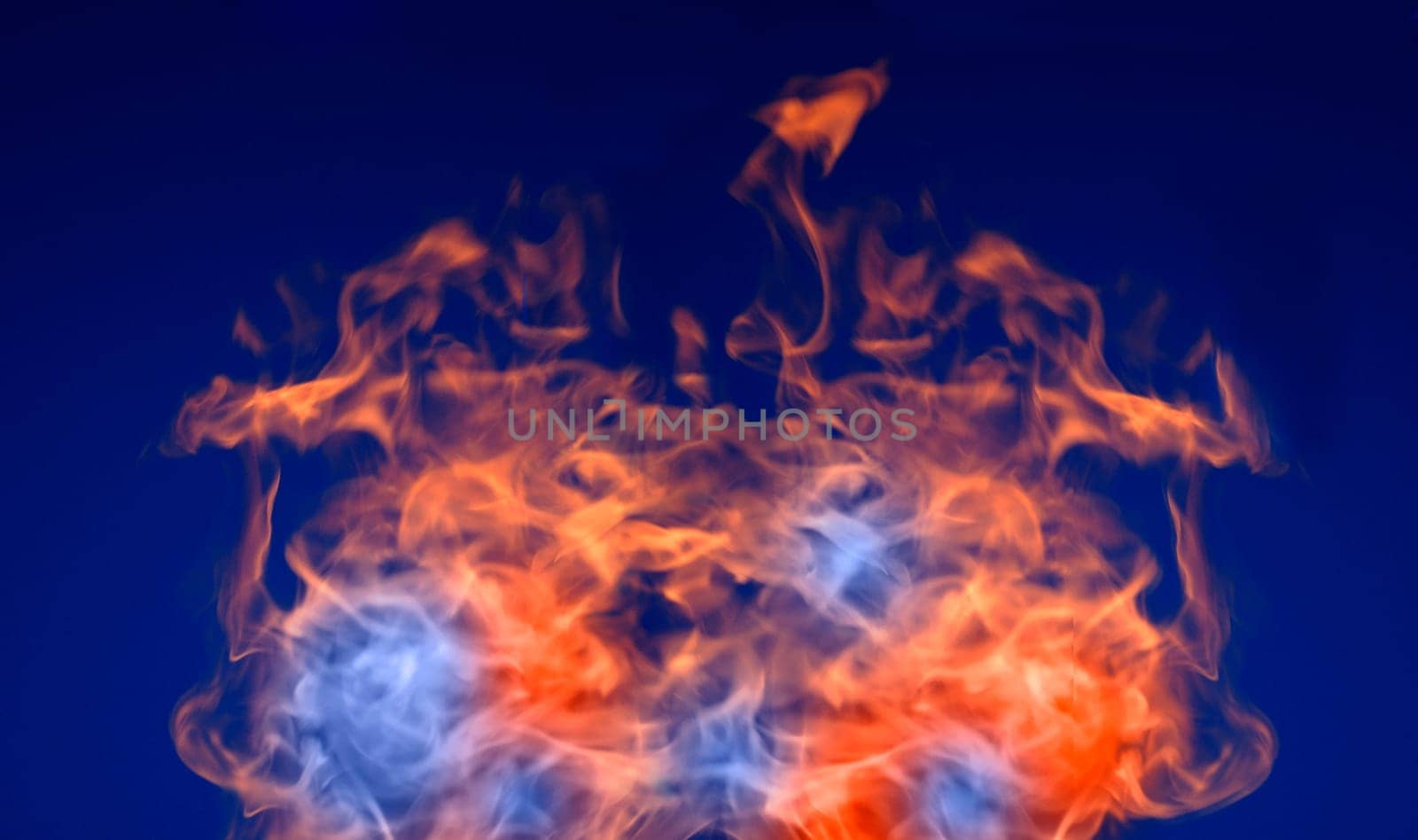 Fire in front of a blue sky