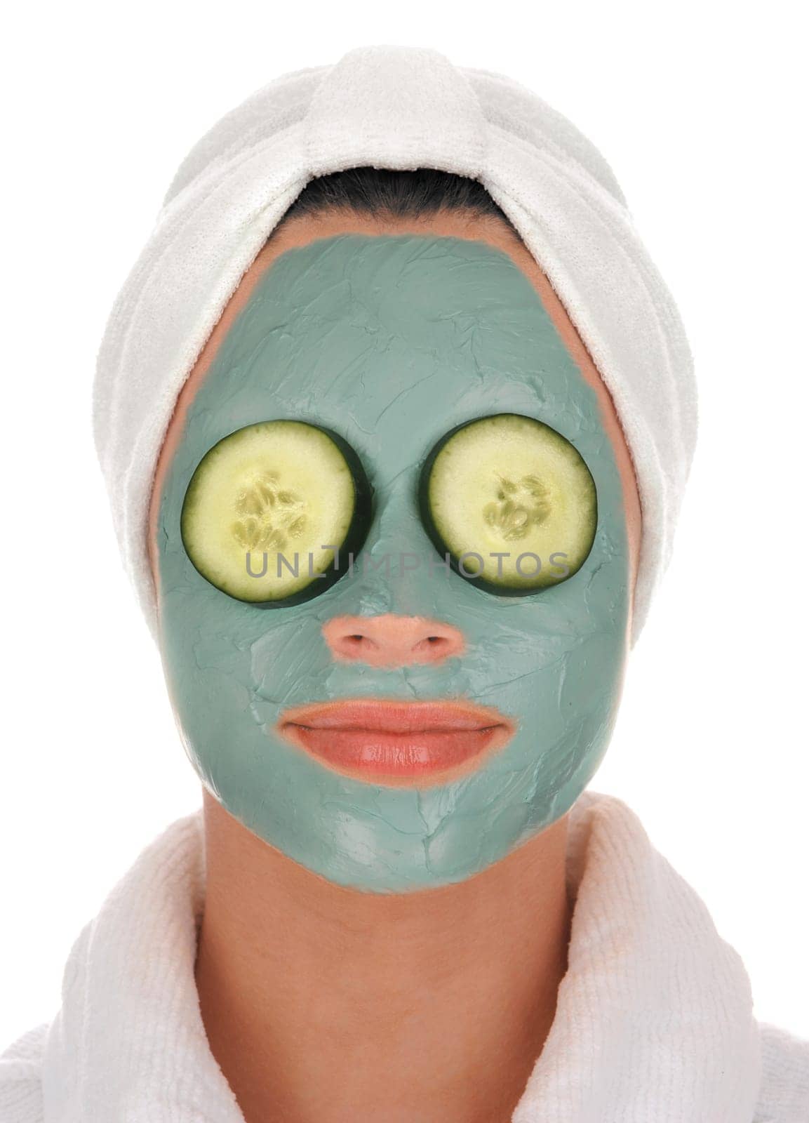 Woman with cucumber mask