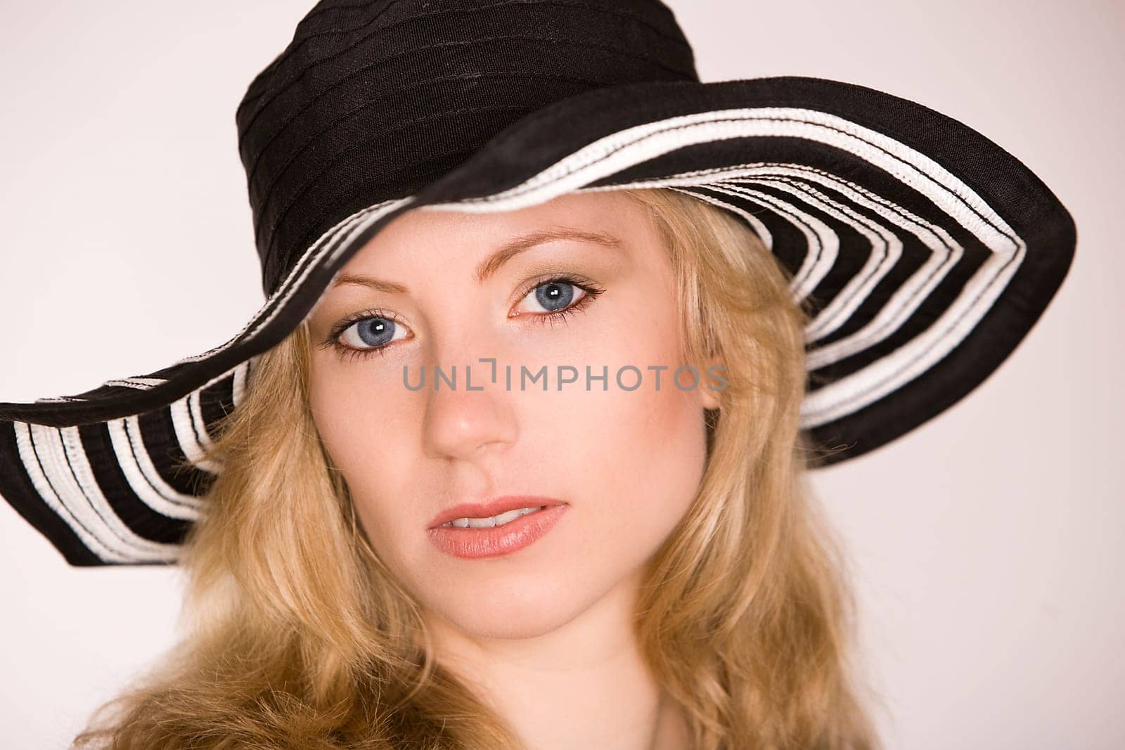 Portrait of a woman with hat