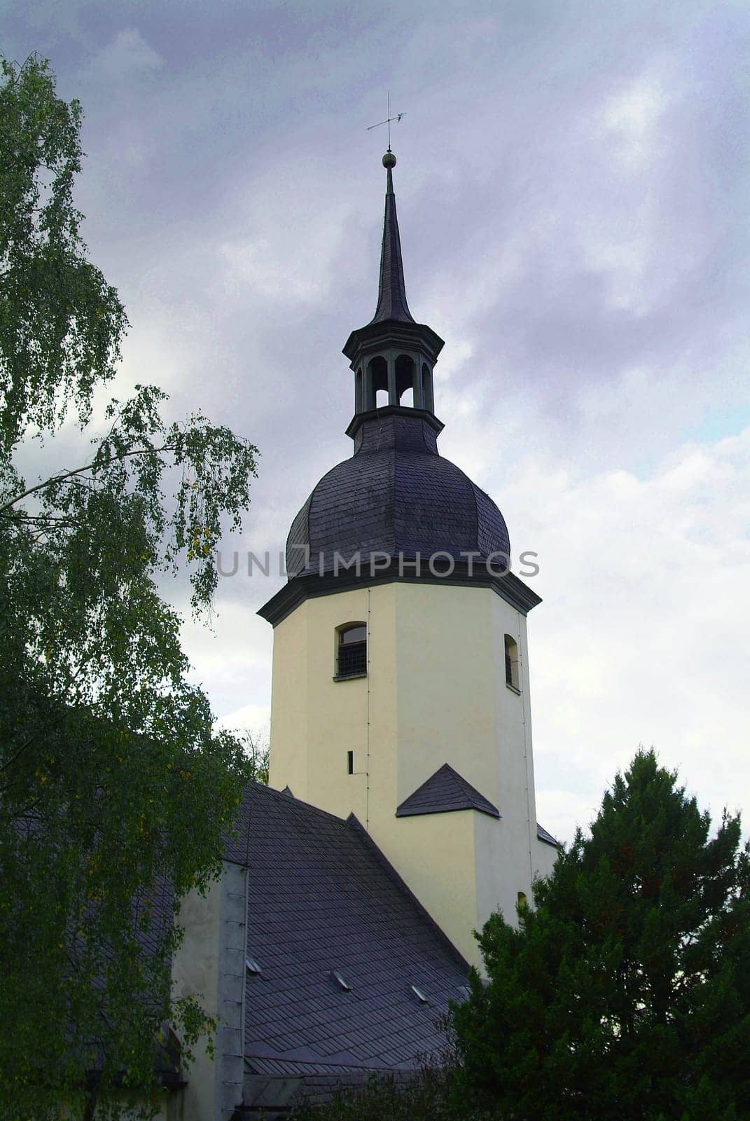 Rain clouds over the church tower