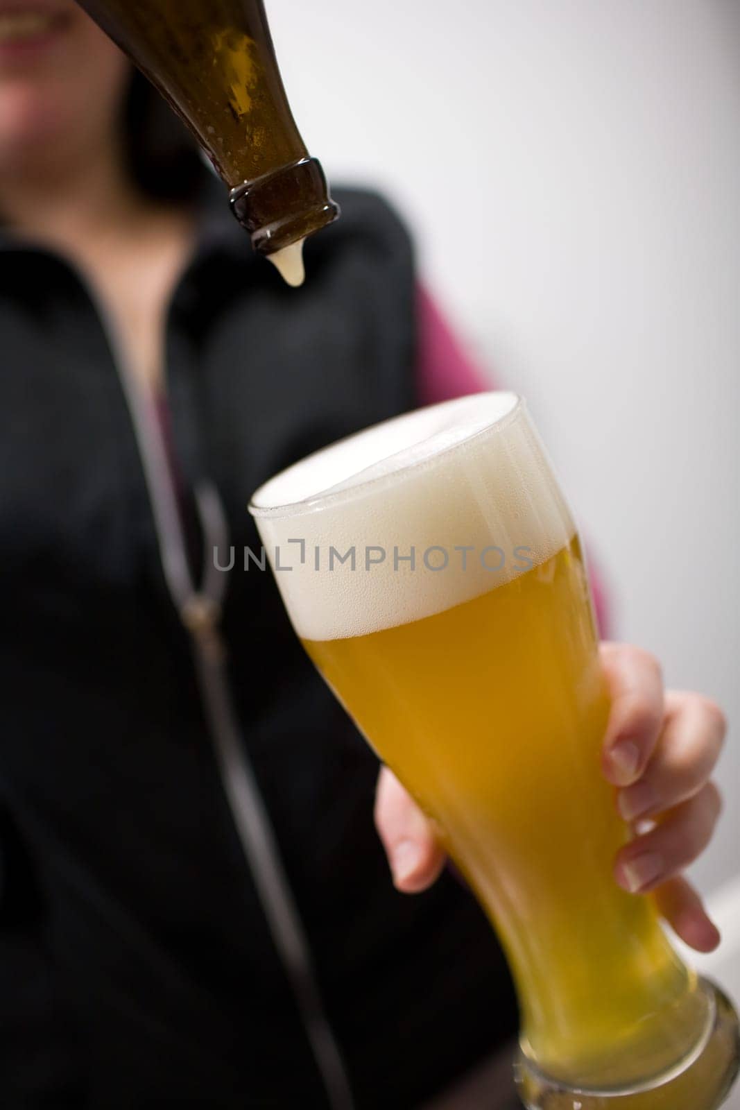 Pouring wheat beer