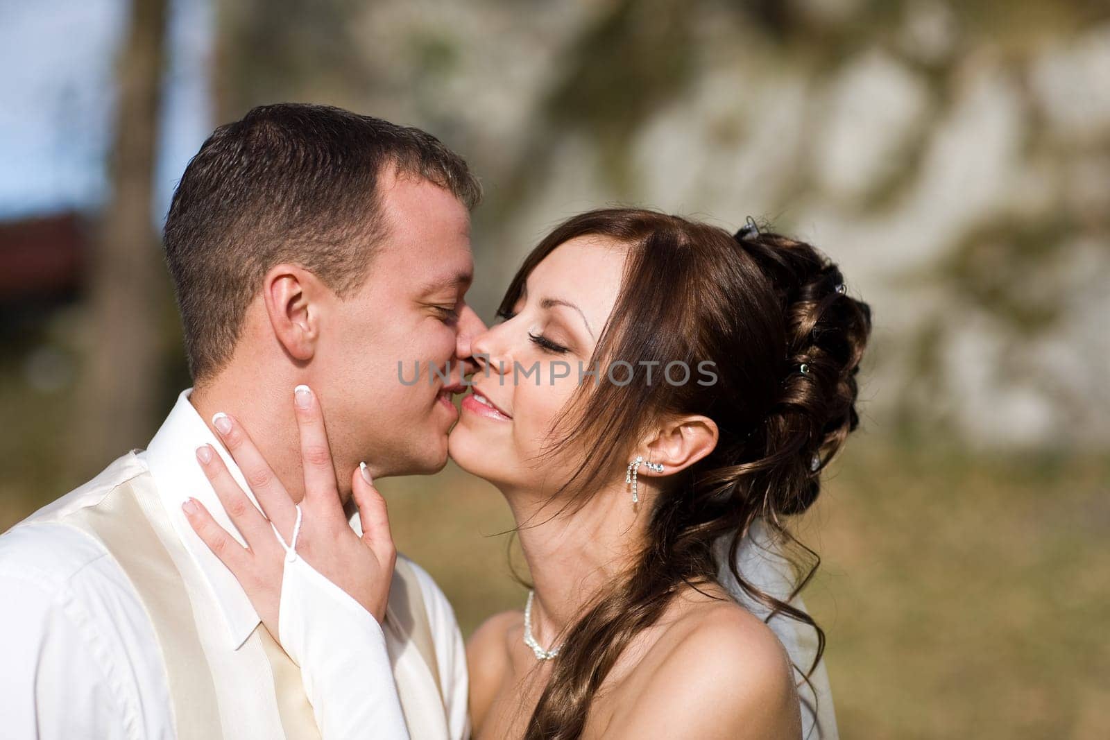 Newlyweds kissing