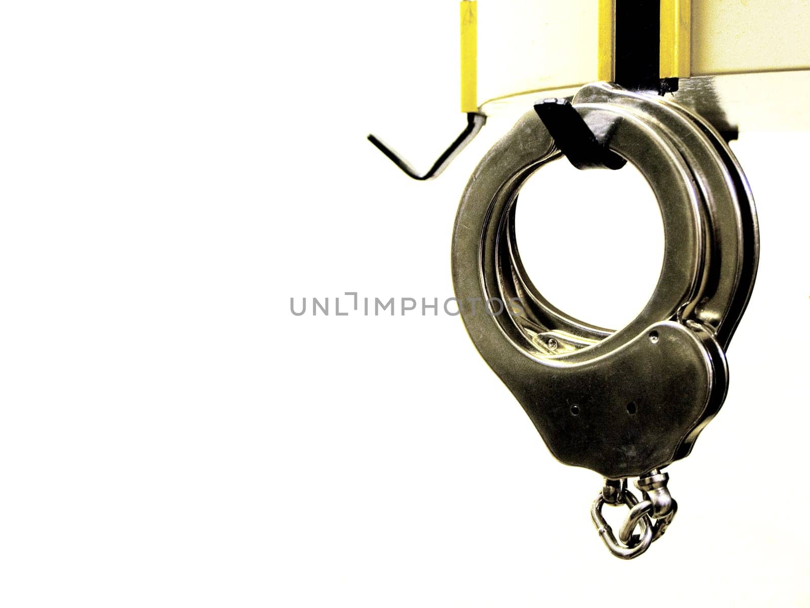 Handcuff on coat hook