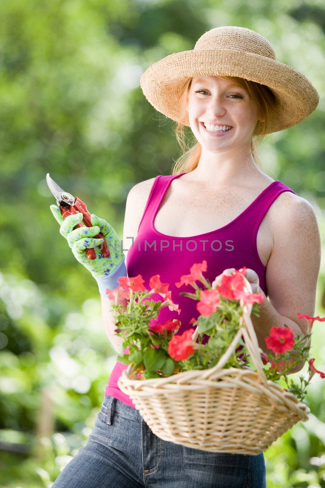 Smiling pretty woman gardener