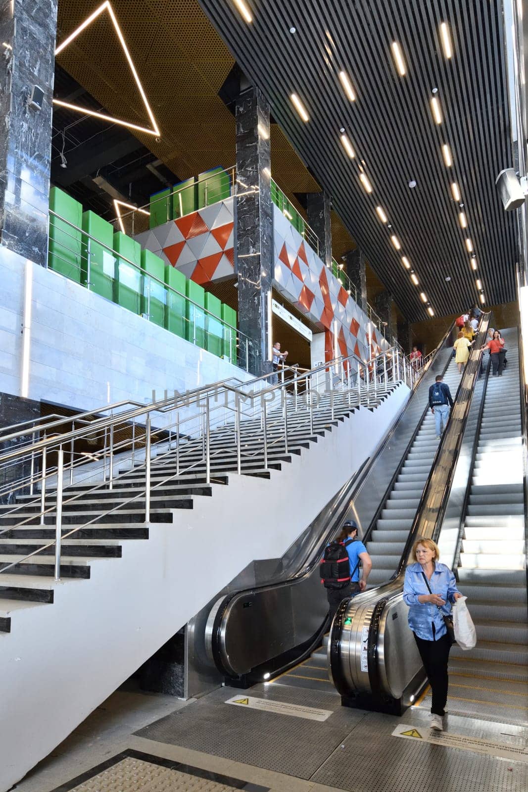 Moscow, Russia - Aug 21. 2023. Escalator and stairs at the Zelenograd-Kryukovo station D3 of the surface metro diameter