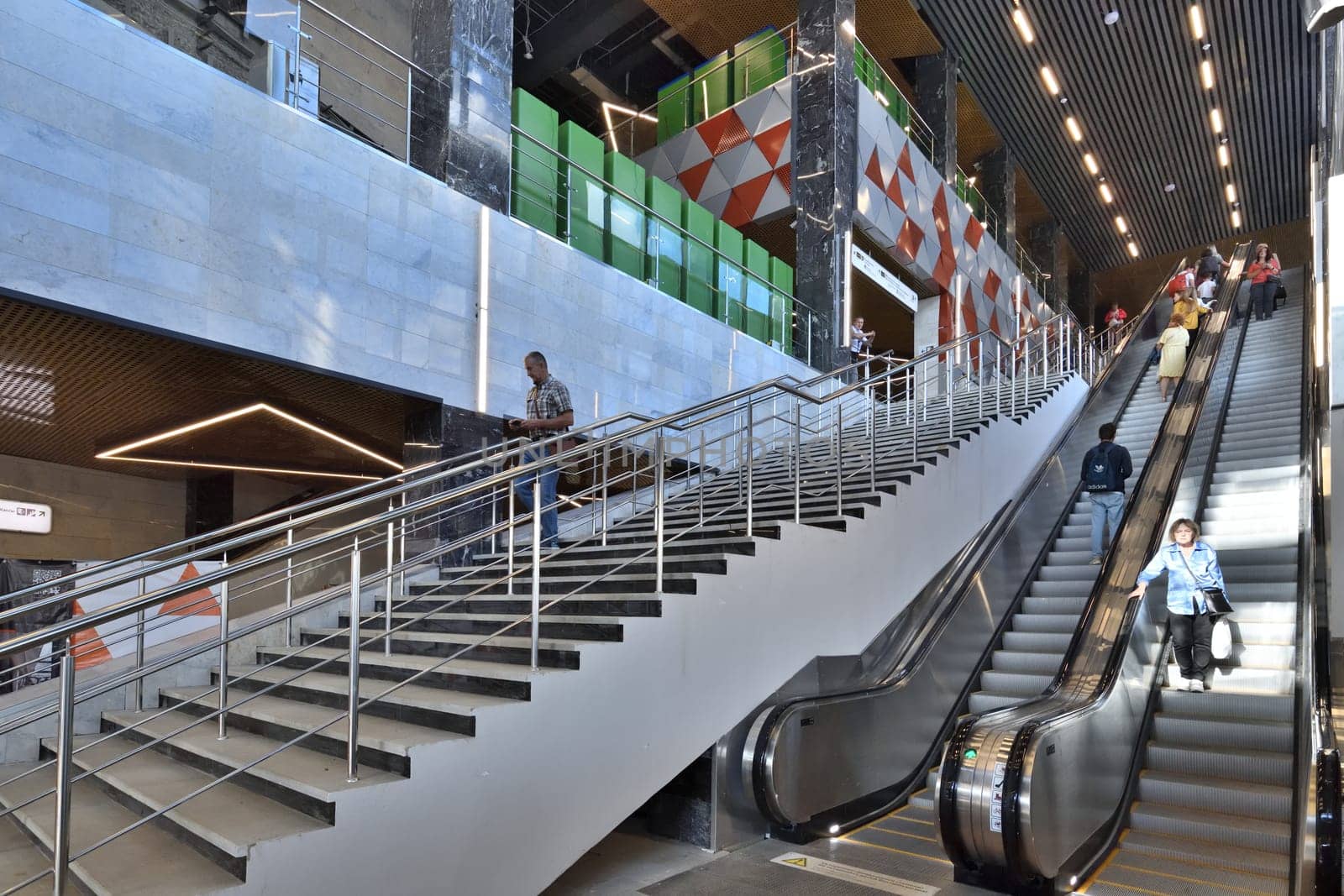 Moscow, Russia - Aug 21. 2023. Escalator and stairs at Zelenograd-Kryukovo station D3 of surface metro diameter by olgavolodina