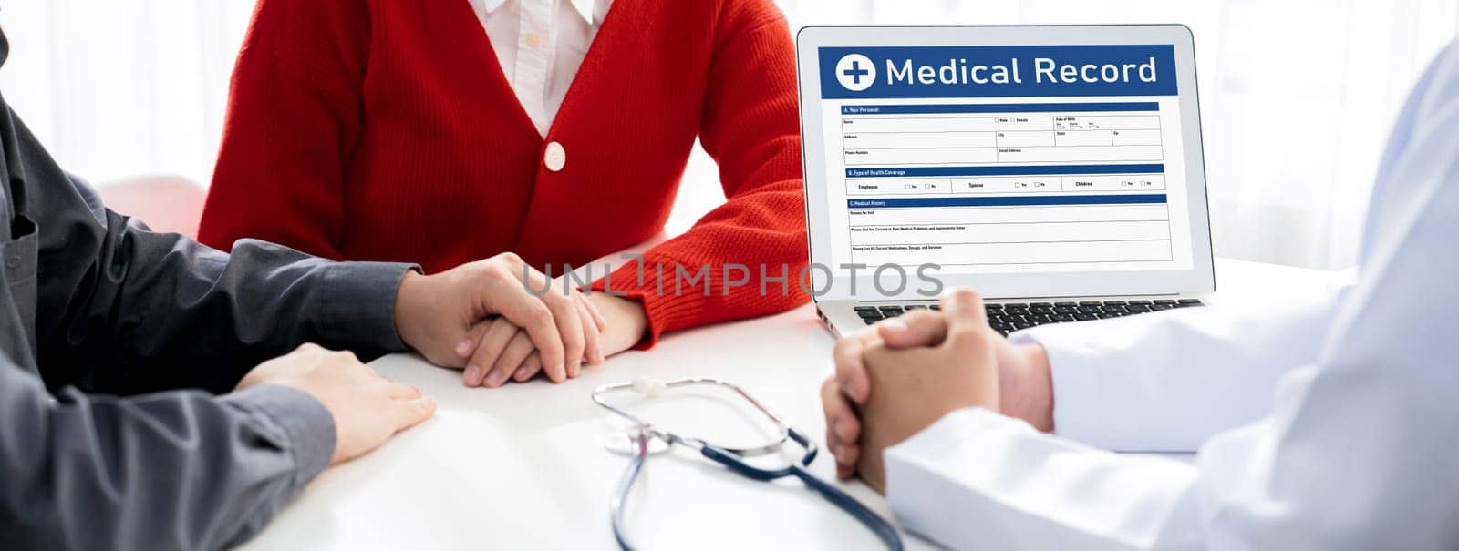 Couple attend fertility or medical consultation with gynecologist at hospital as family planning care for pregnancy. Husband and wife consoling each other through doctor appointment. Panorama Rigid