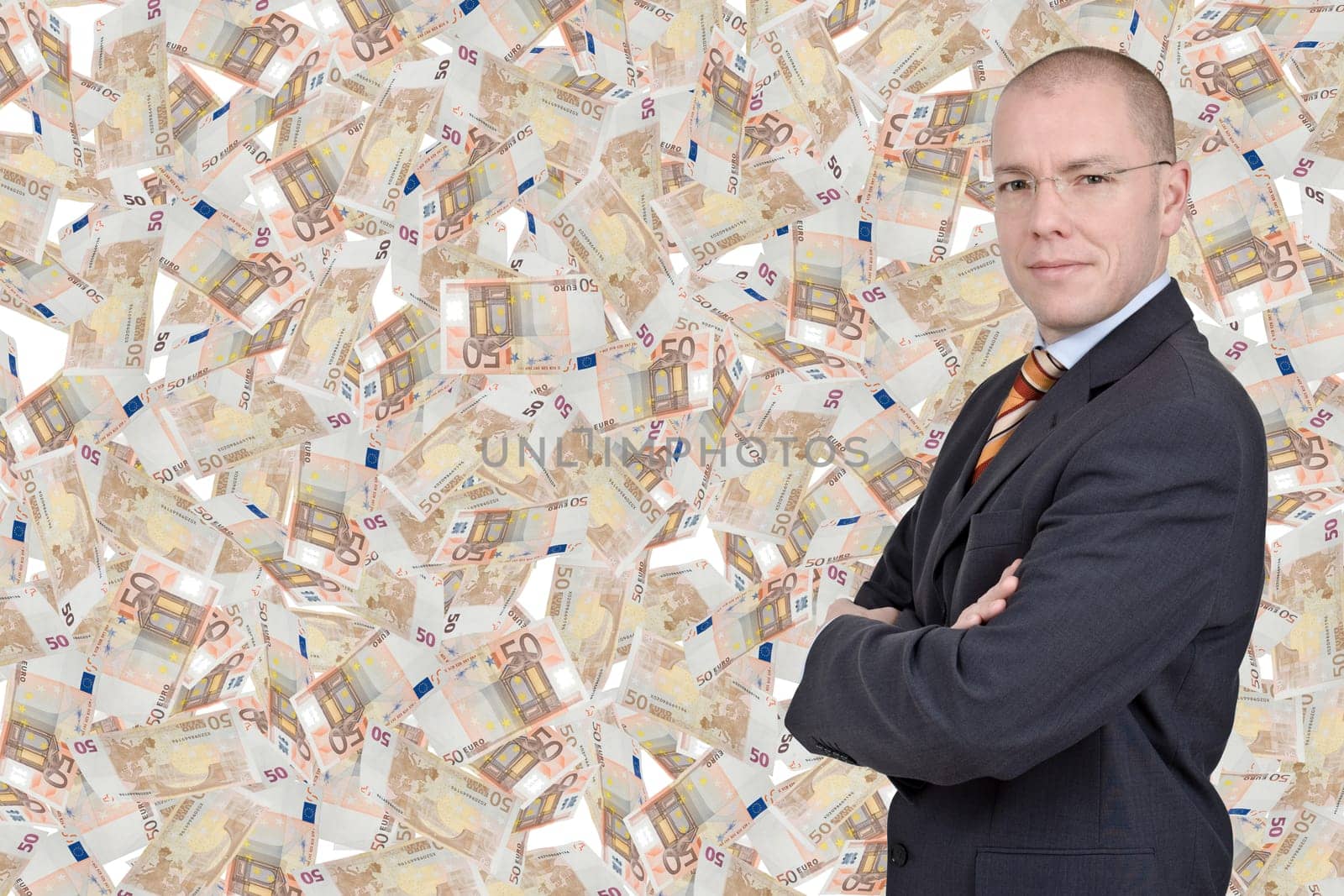 Businessman in the rain of money