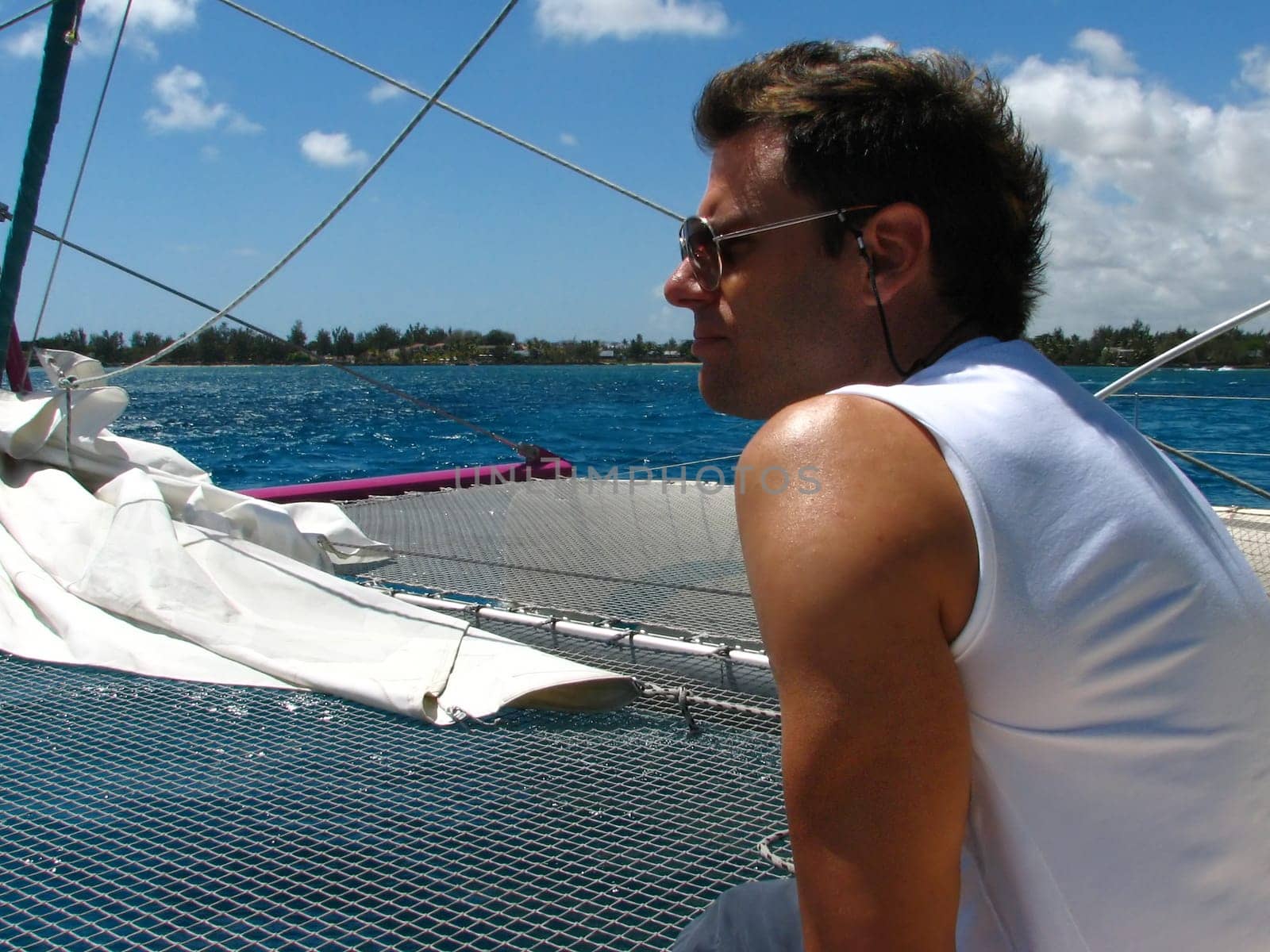 Man on a catamaran