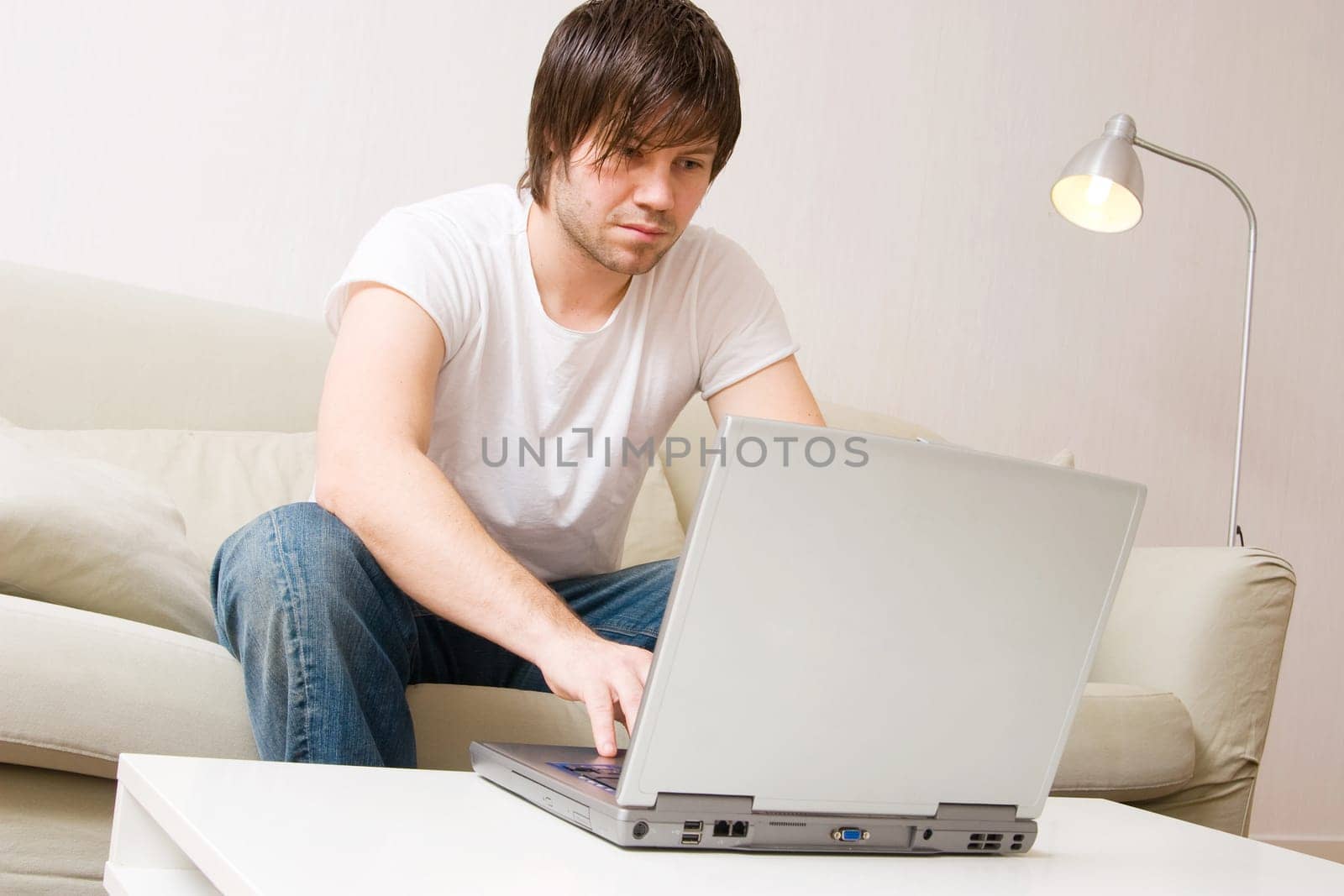 young businessman doing work at home