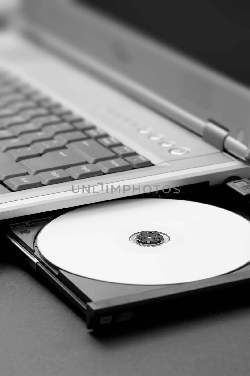 Open laptop CD-ROM drive