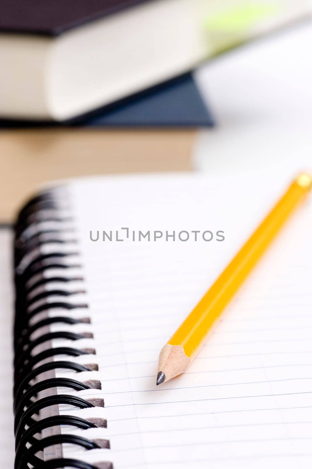 pencil on notebook