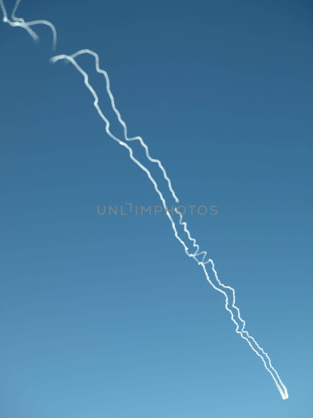 Contrails in the blue sky