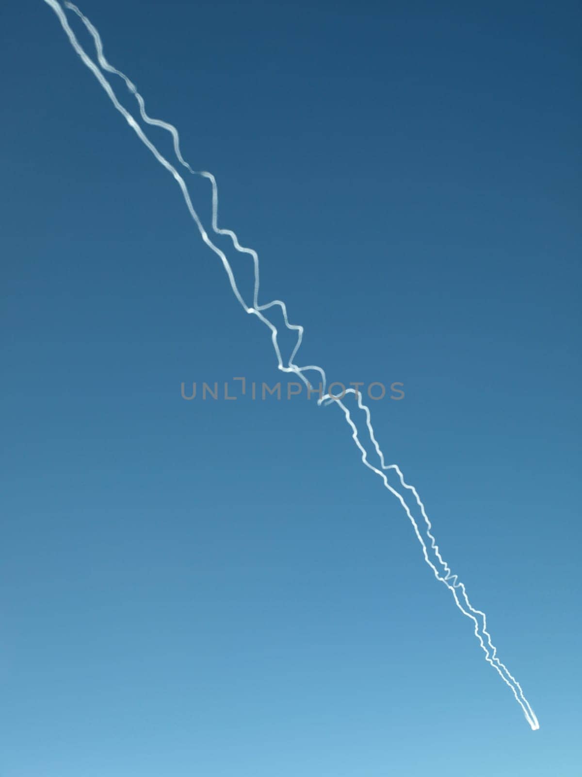 Contrails in the blue sky
