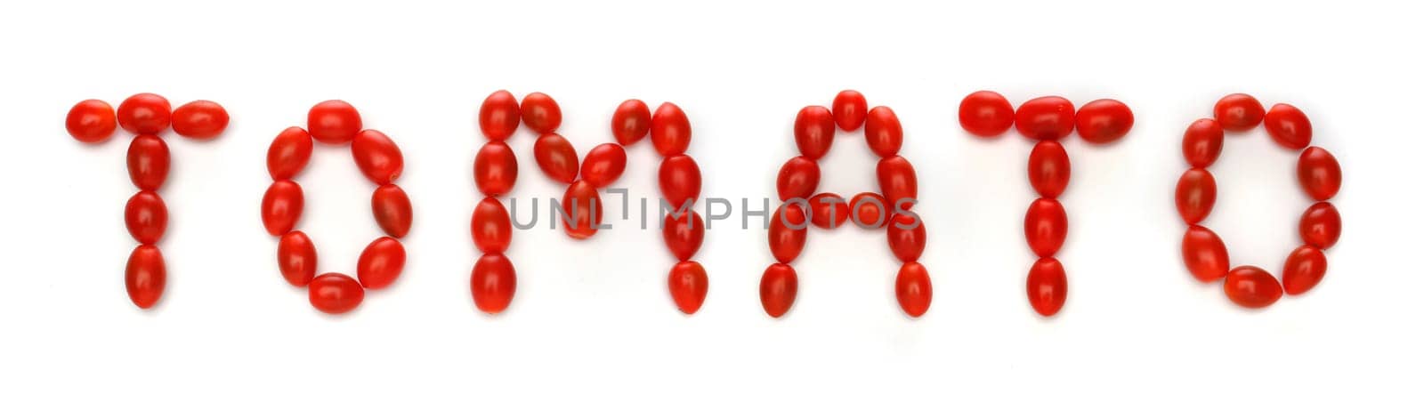 word tomato written with cherry tomatoes