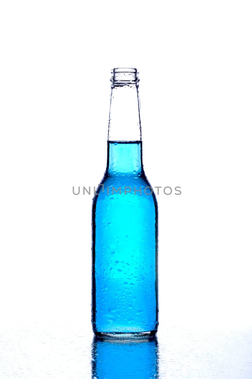bottle with blue liquid on white