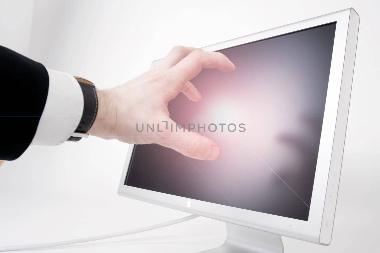 Hand Reaches for Monitor