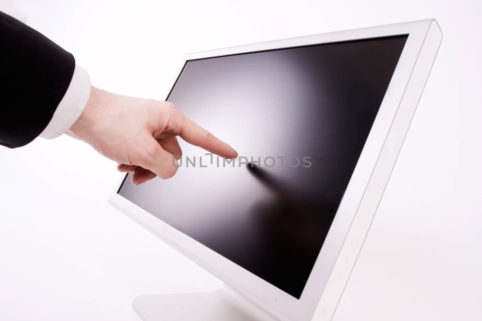 finger pointing at monitor
