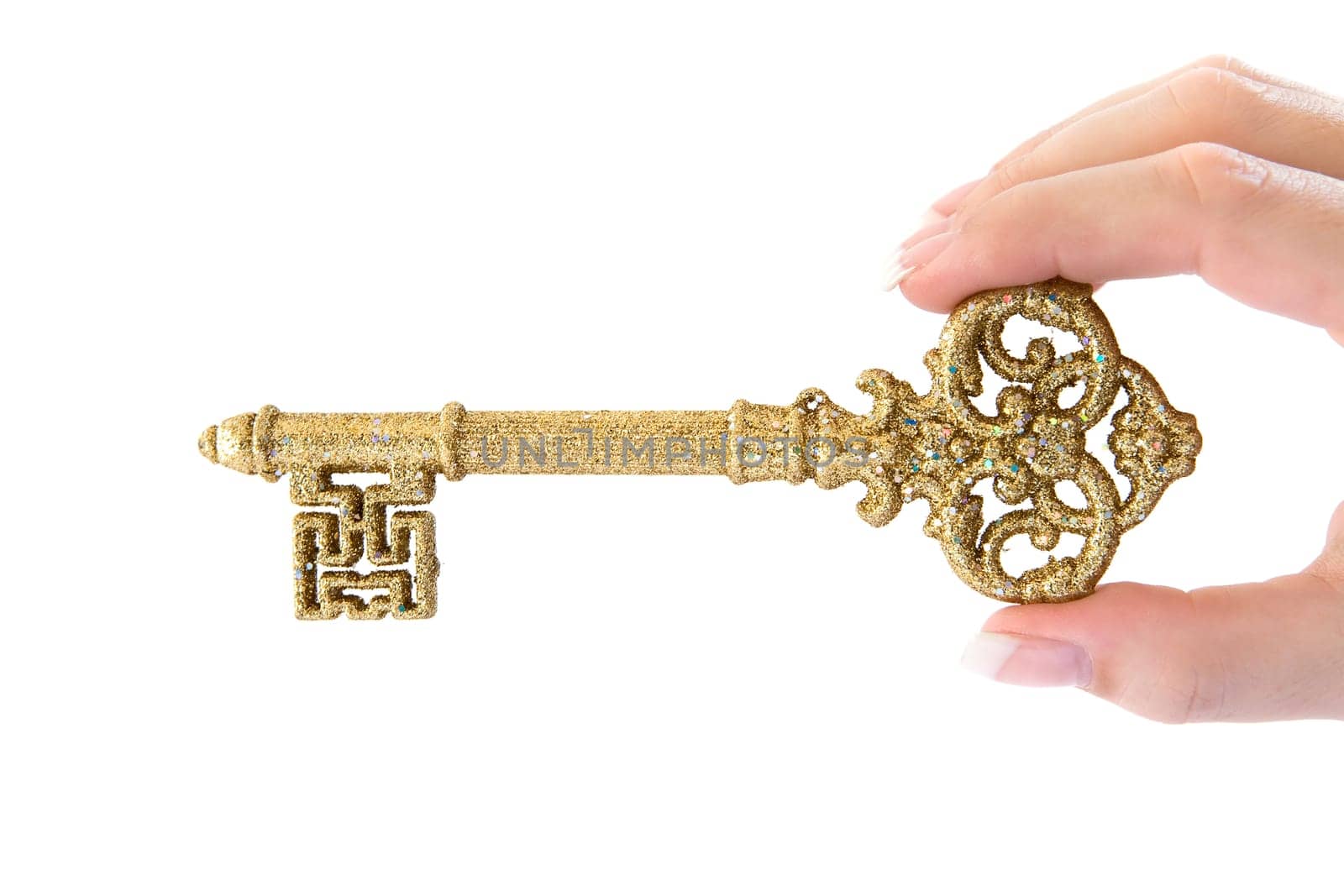 Gold key in hand