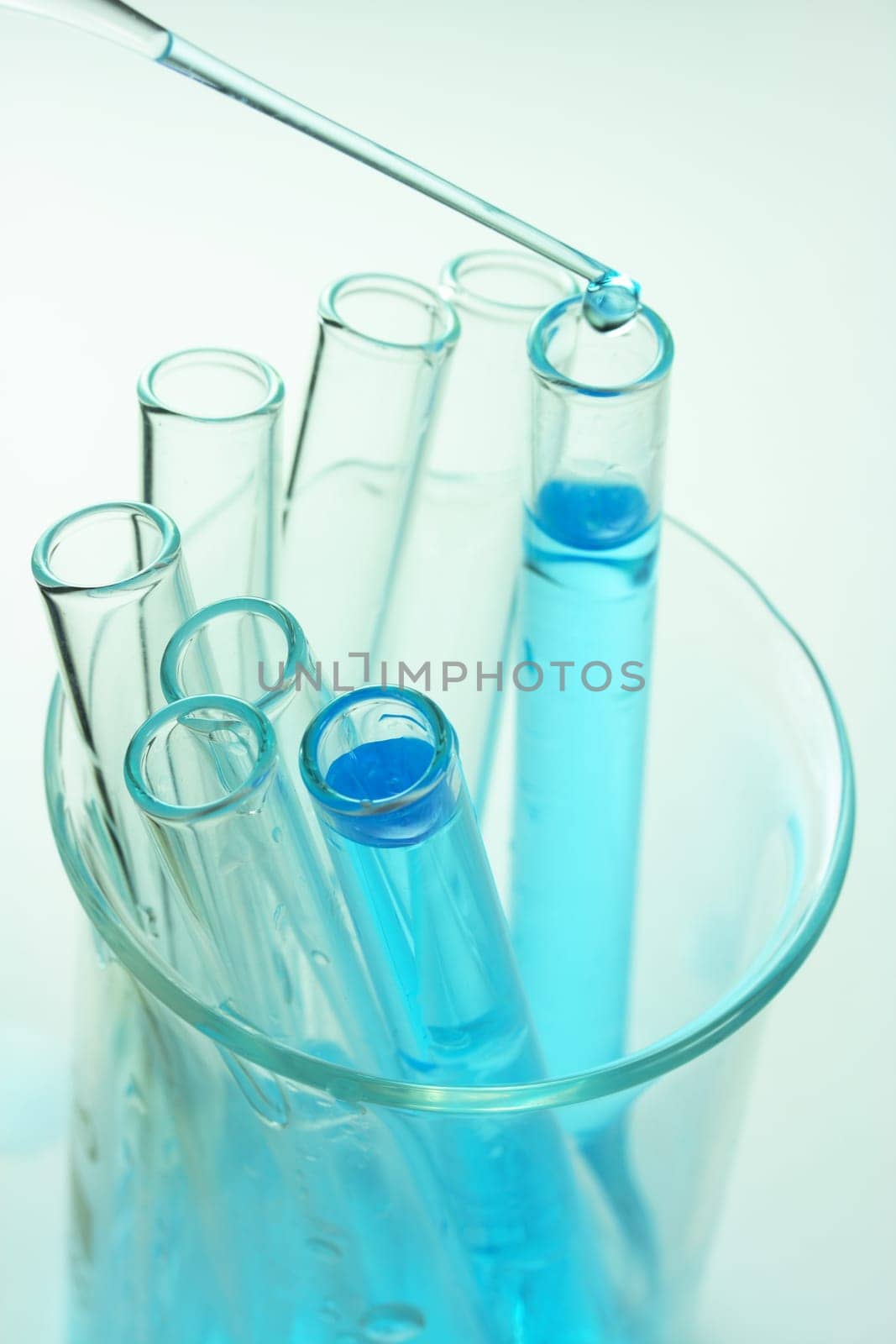 Pipette and blue liquid
