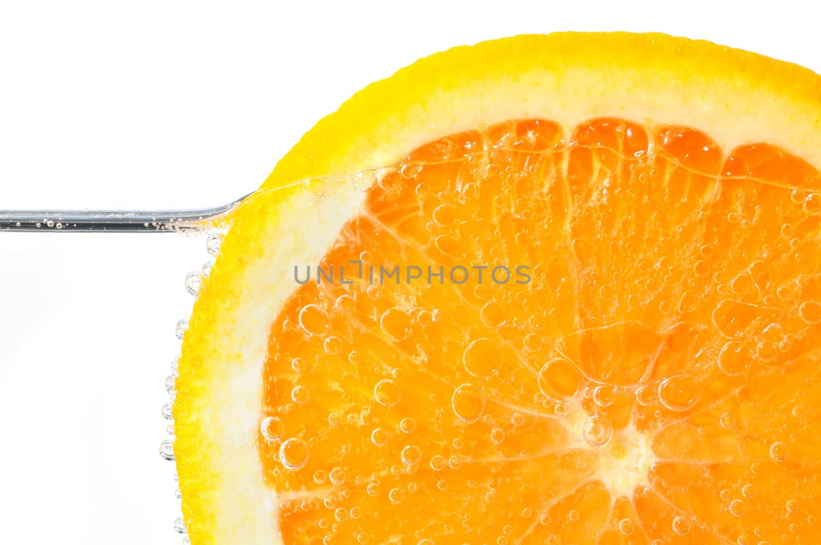 Orange slice in water