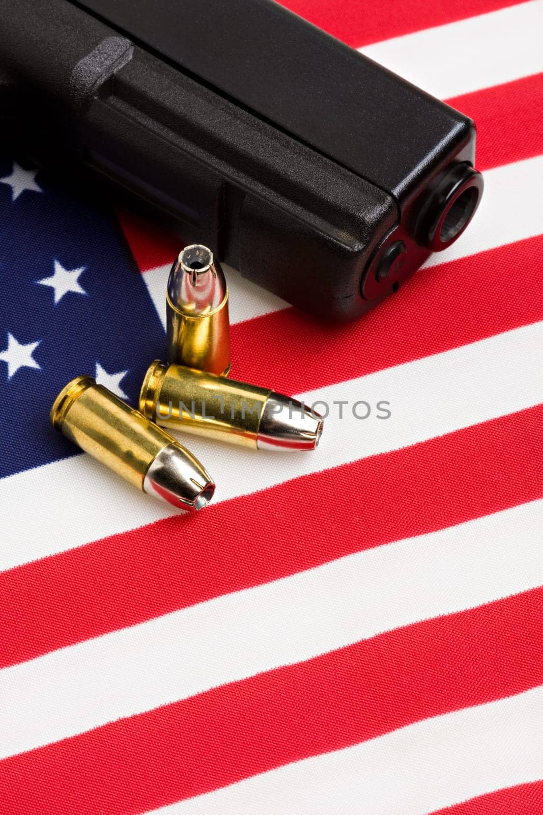 gun and bullets on flag