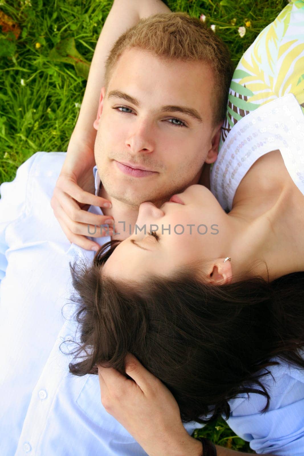 Happy couple on a meadow