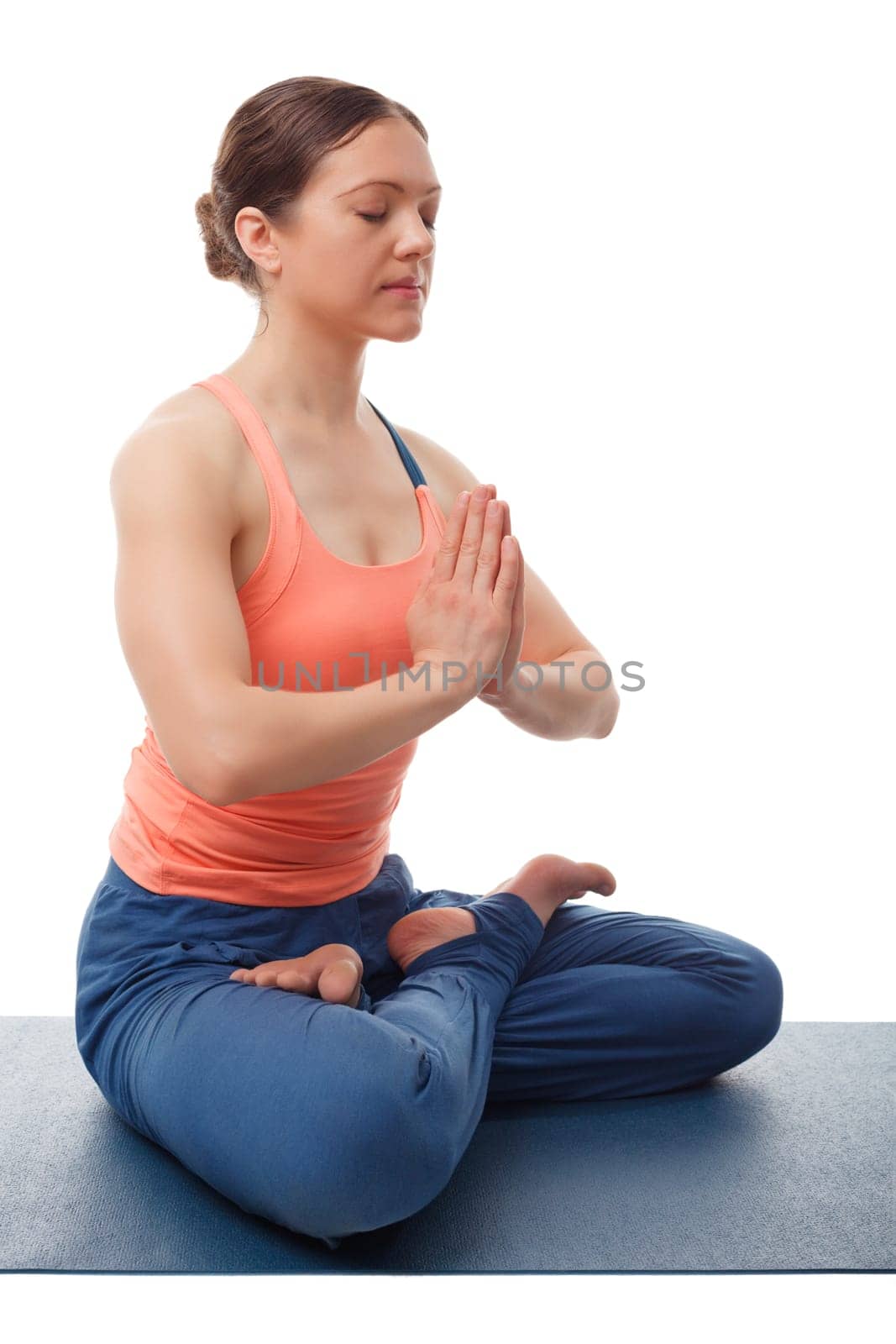 Beautiful sporty fit yogini woman meditates in Padmasana asana l by dimol