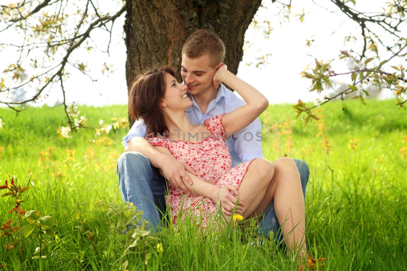 Happy couple on a meadow