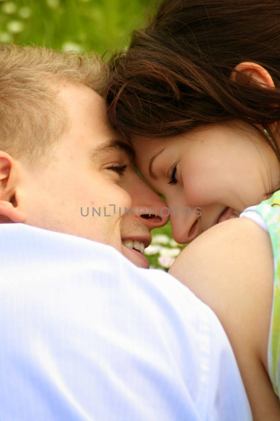 Happy couple on a meadow