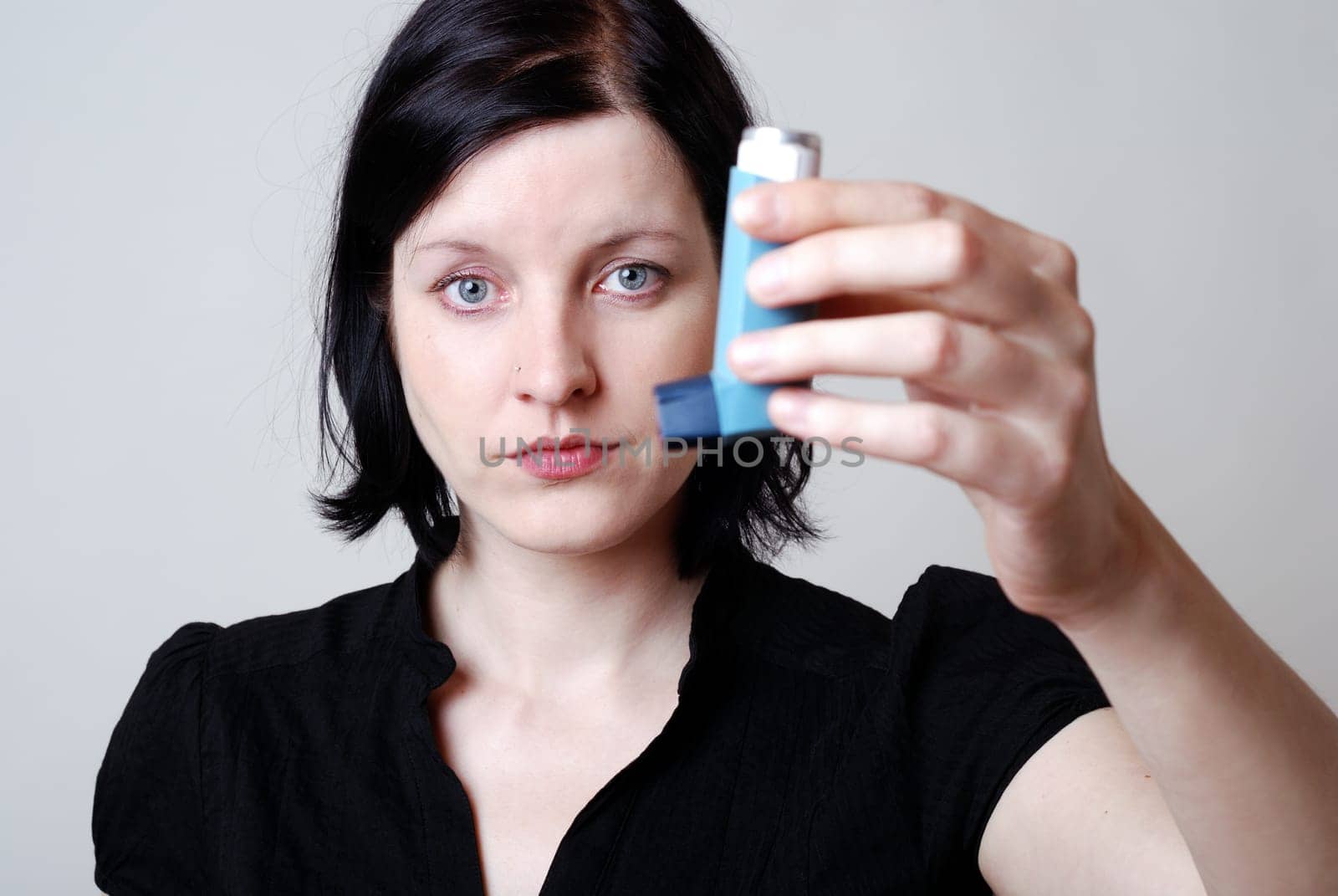 Woman with inhaler