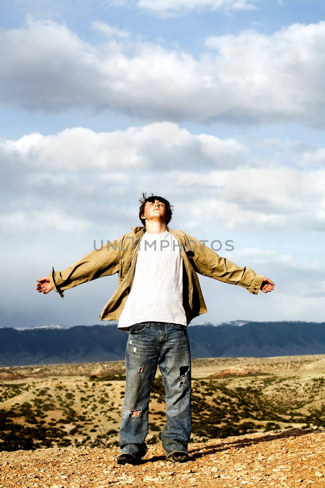 freedom - teen with arms with open