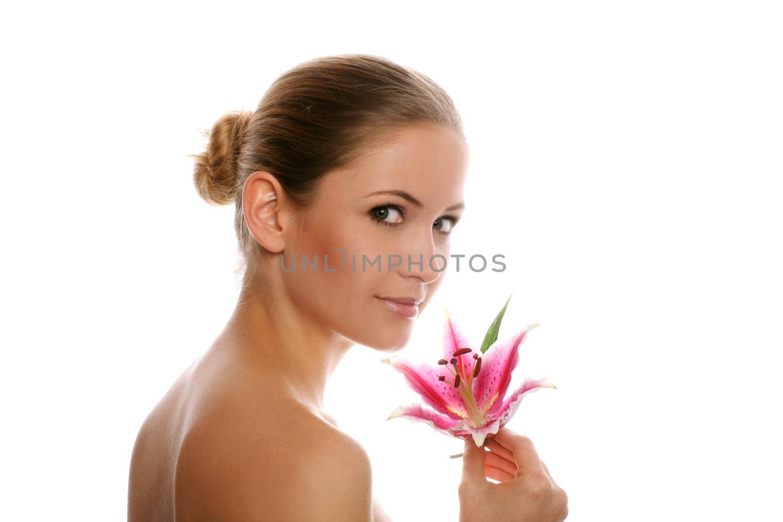 Beauty portrait of a woman with flower