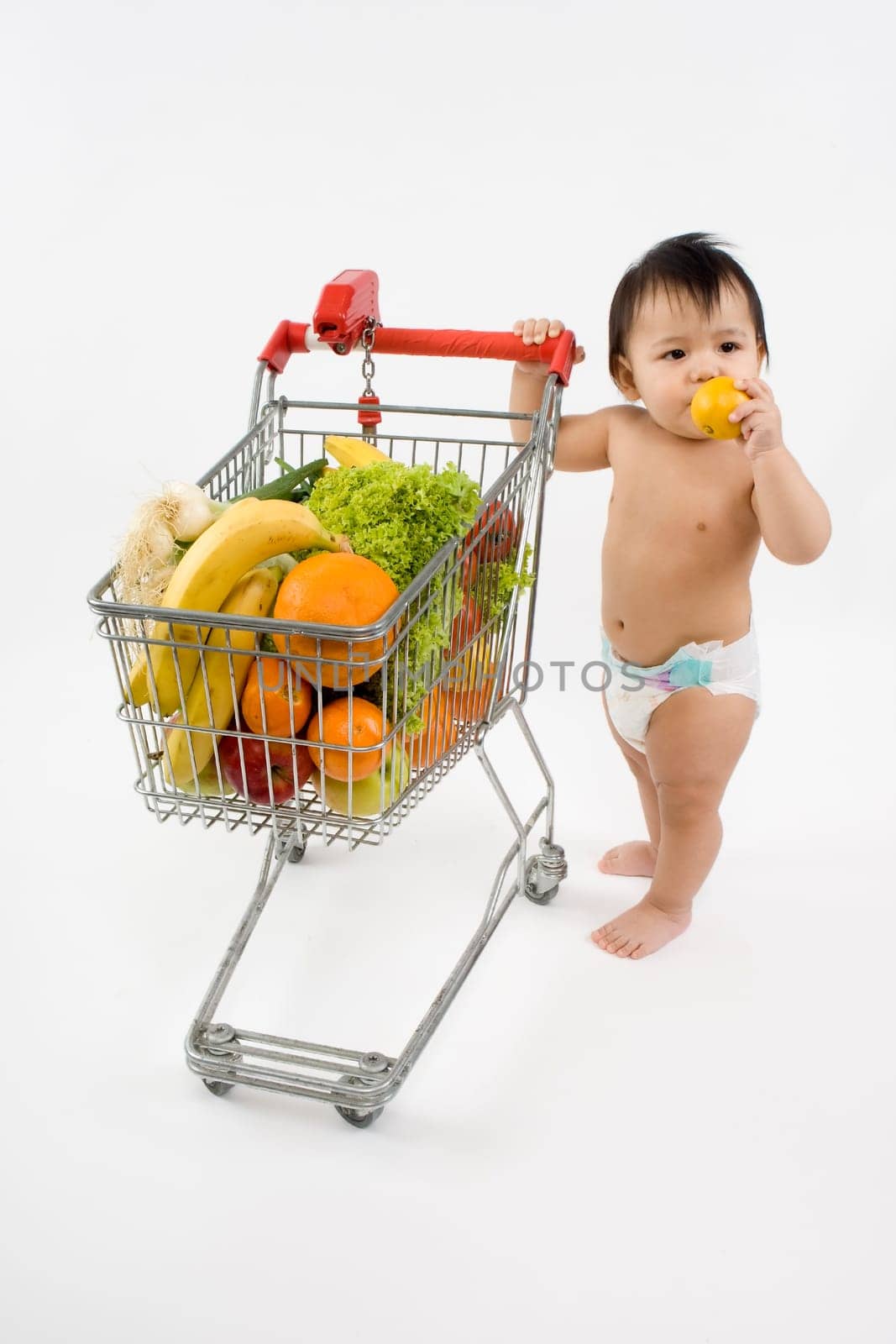Baby with shopping cart