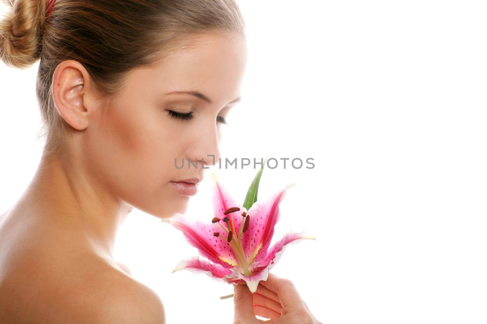 Beauty portrait of a woman with flower