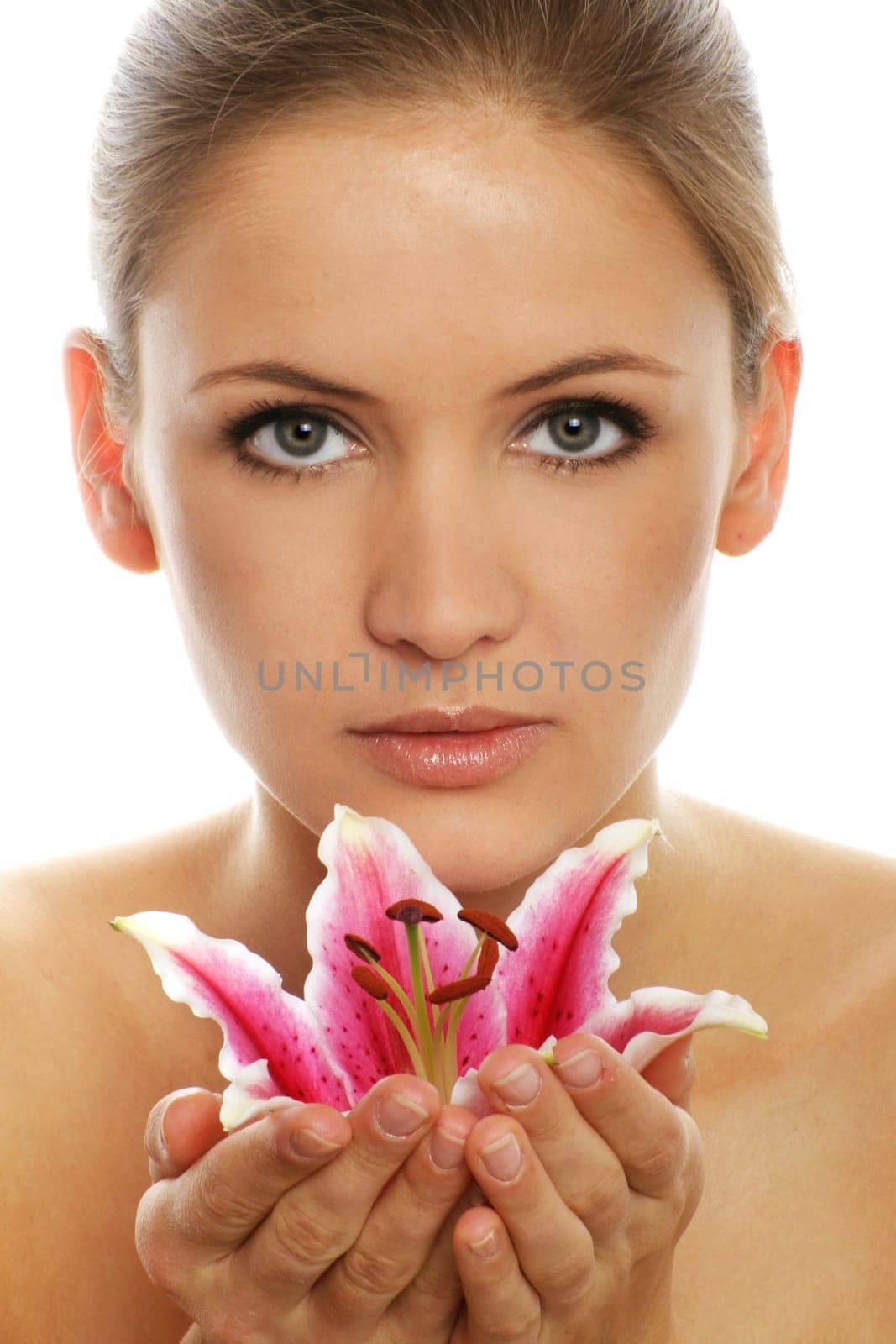 Beauty portrait of a woman with flower