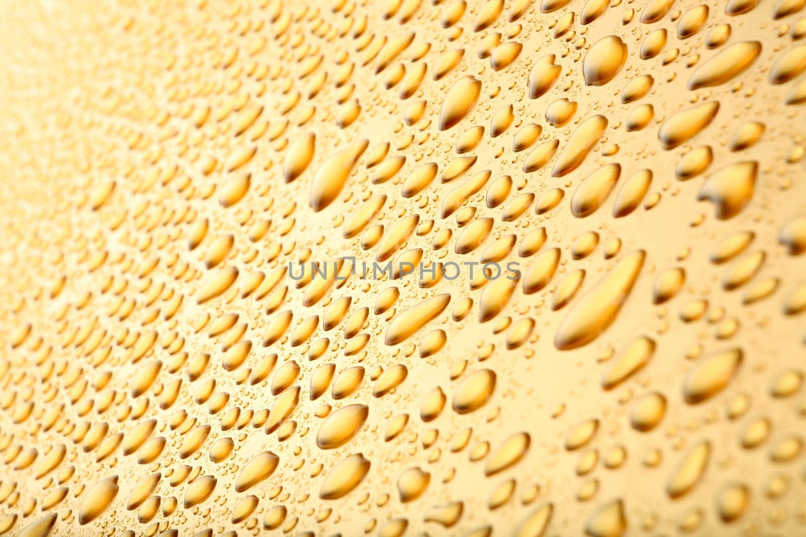 water drops background on gold
