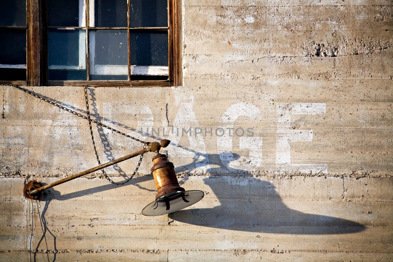 old lantern on garage wall