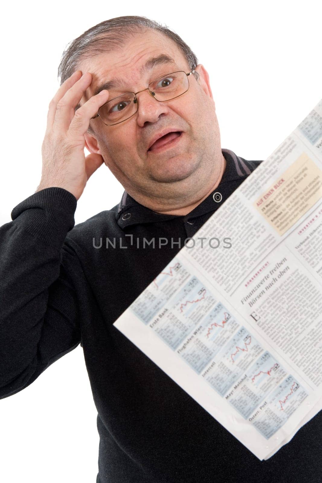 Senior reads newspaper