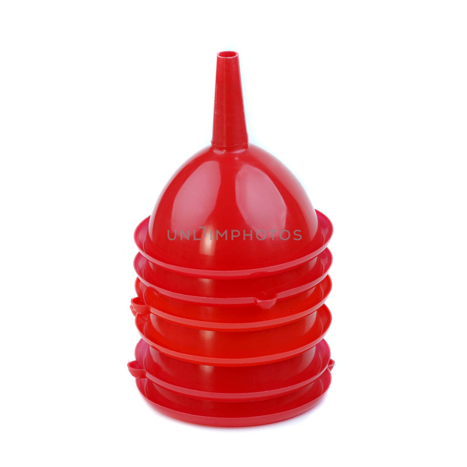 Stack of red plastic funnels